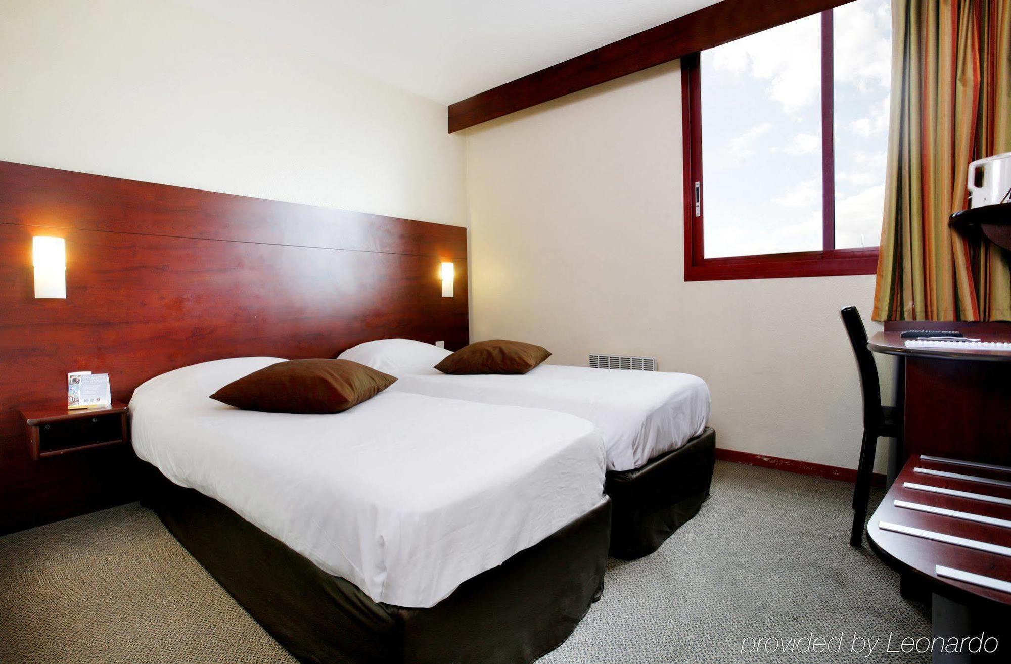 Hotel Gallieni แฌเนอวีลิเยร์ ภายนอก รูปภาพ